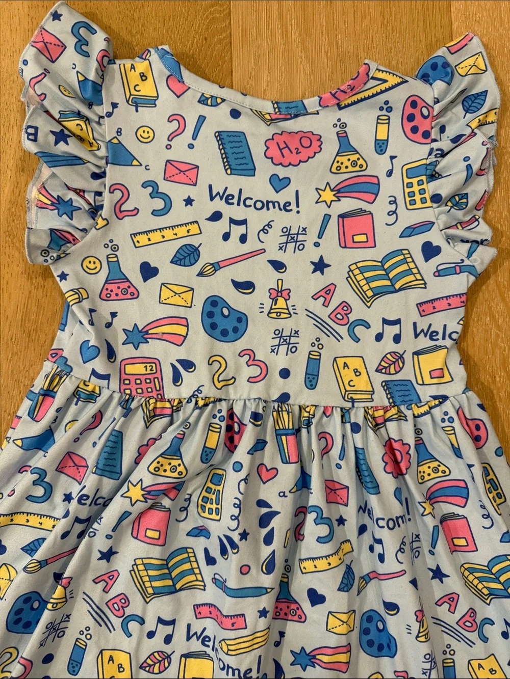 NWOT Girls' Light Blue Back to School Print Flutter-Sleeve Dress size 6-7